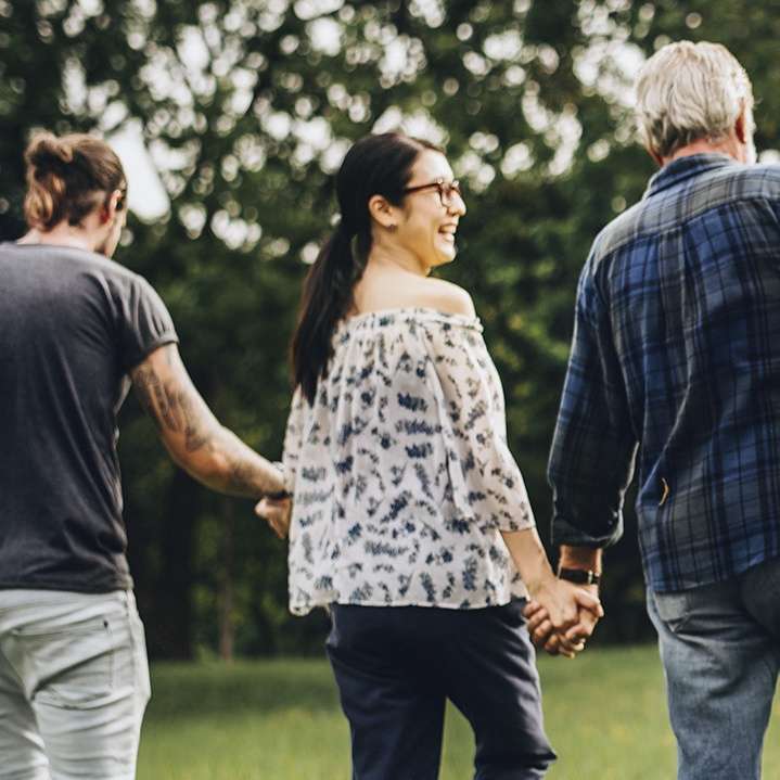 People holding hands — community CSR